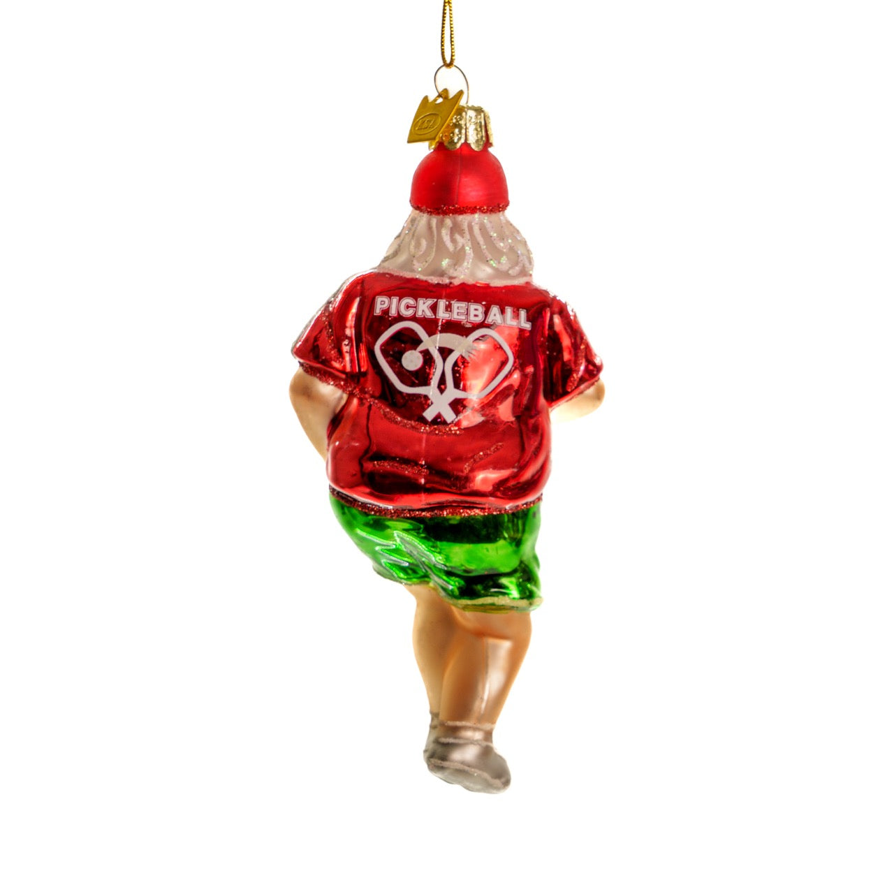 Back of a fun handmade glass Christmas ornament of Santa playing pickleball hanging in front of a white studio backdrop