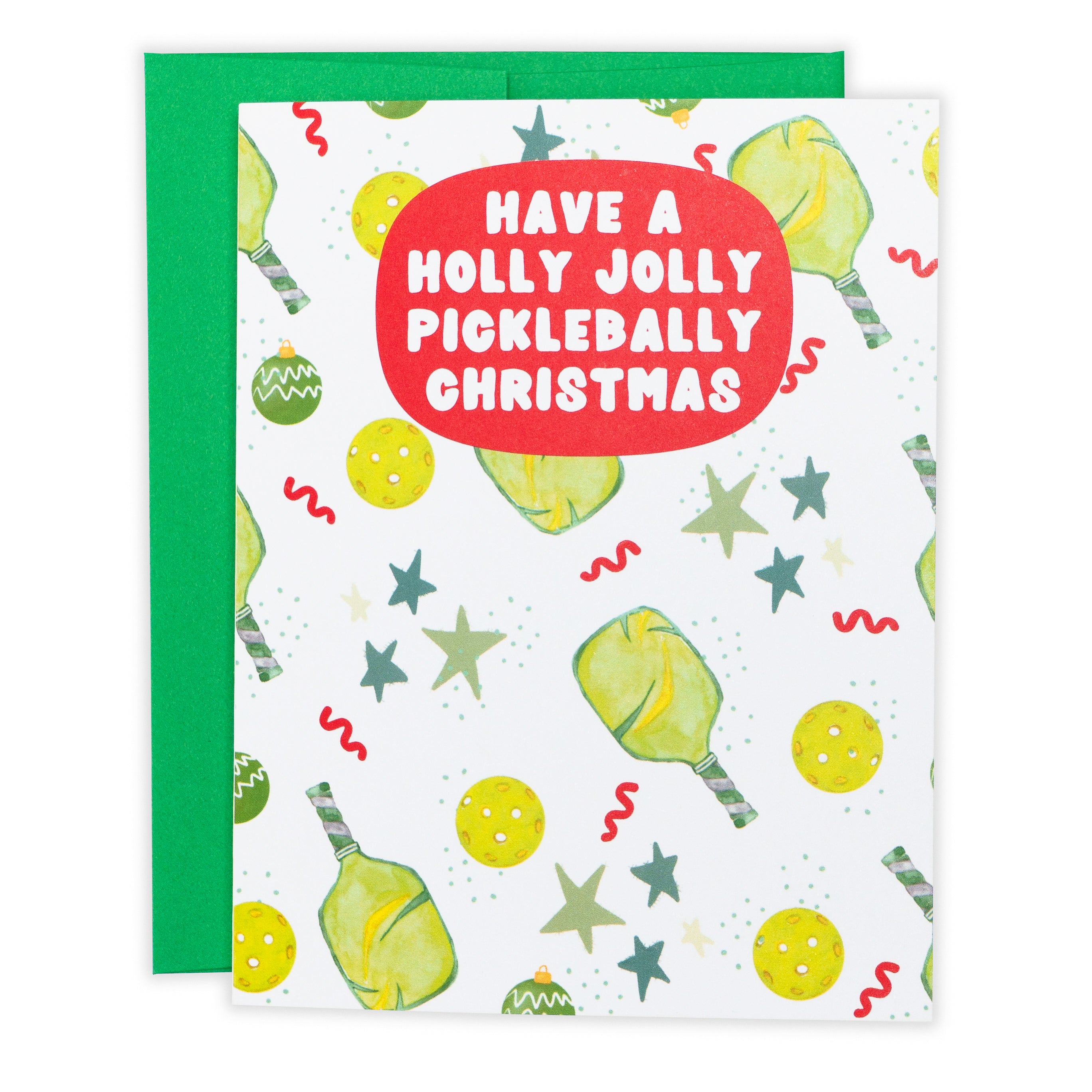 Pickleball-themed christmas card that says "Have A Holly Jolly Picklebally Christmas" laying flat