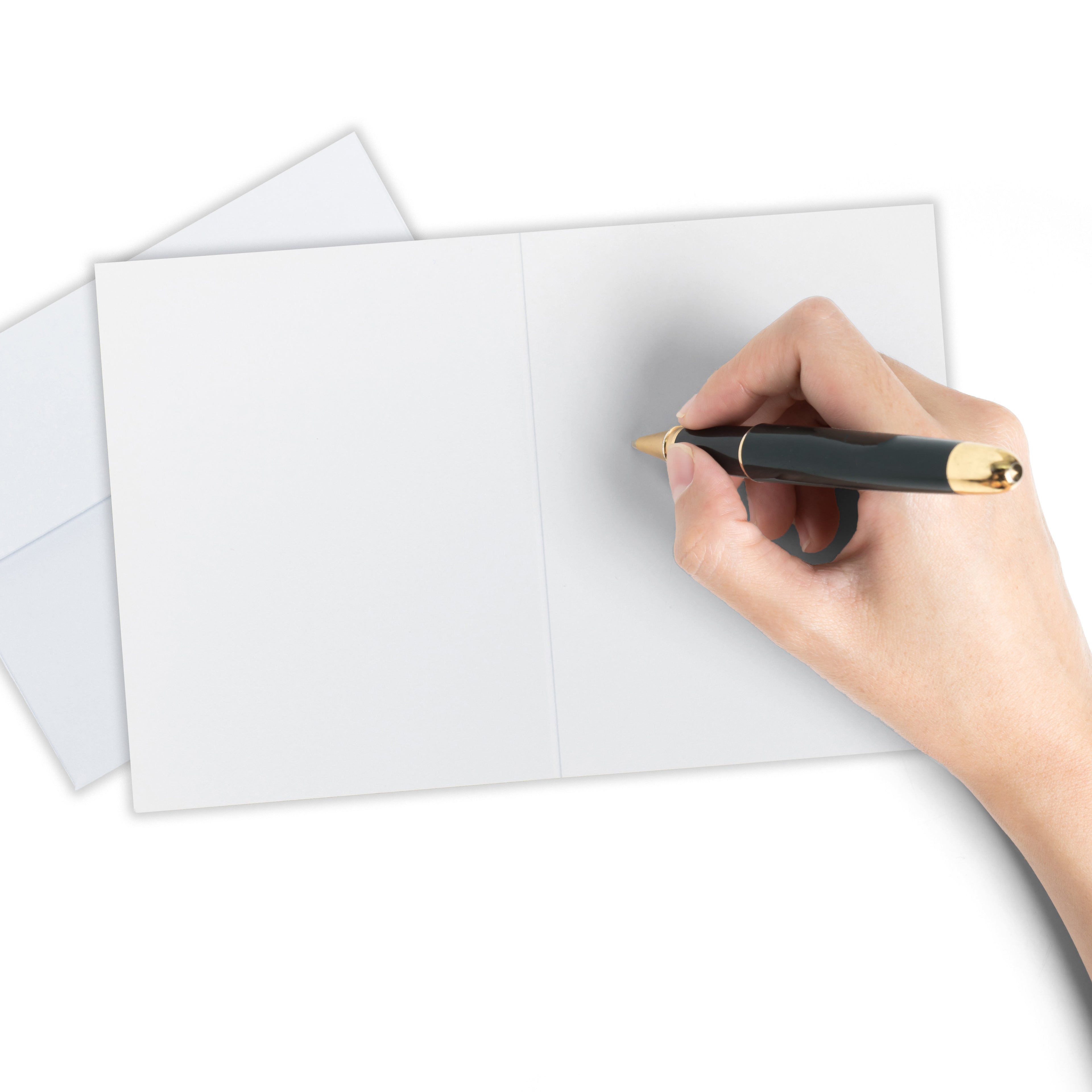 Blank inside of a pickleball Christmas card and a woman about to write a message