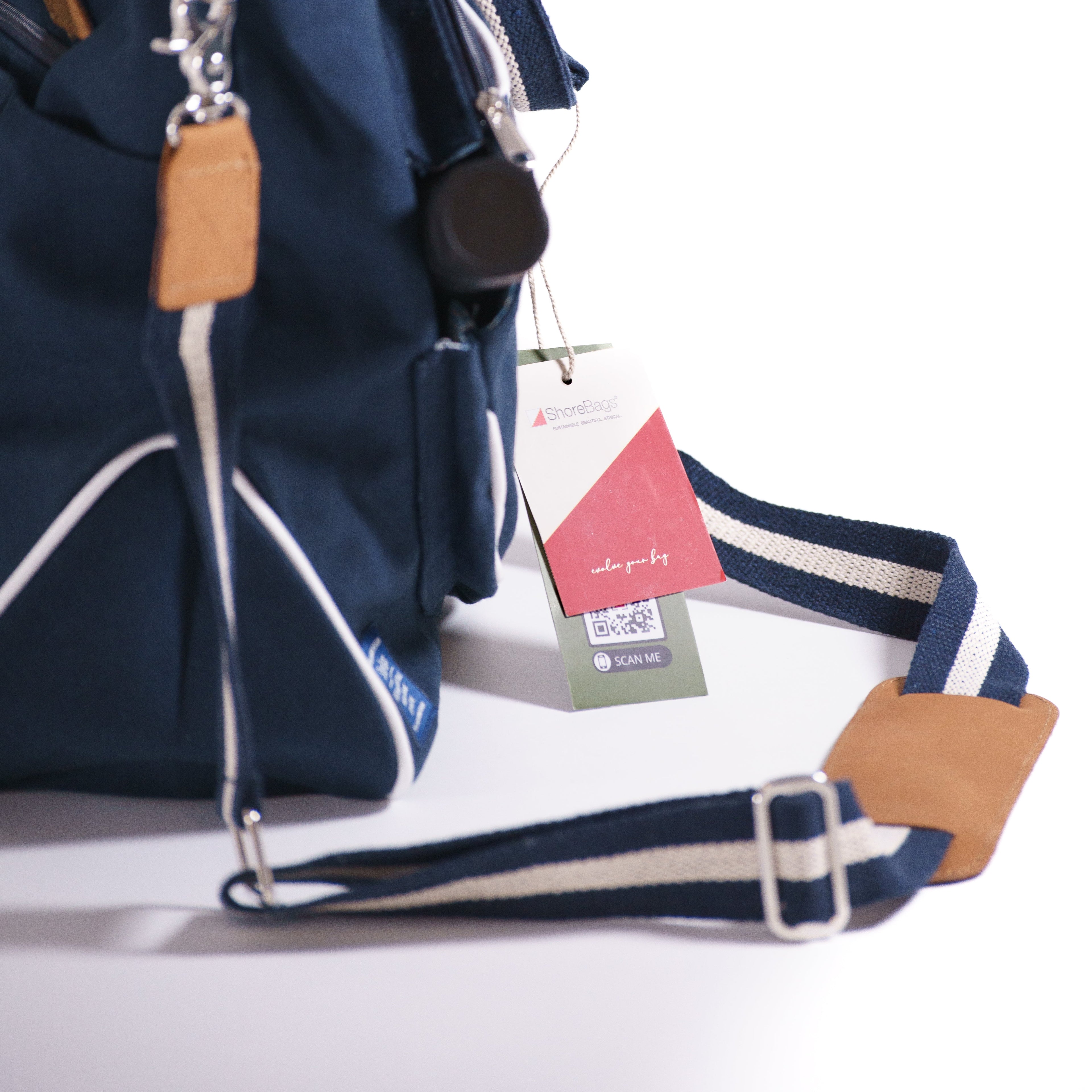Detailed view of strap of navy blue canvas pickleball bag