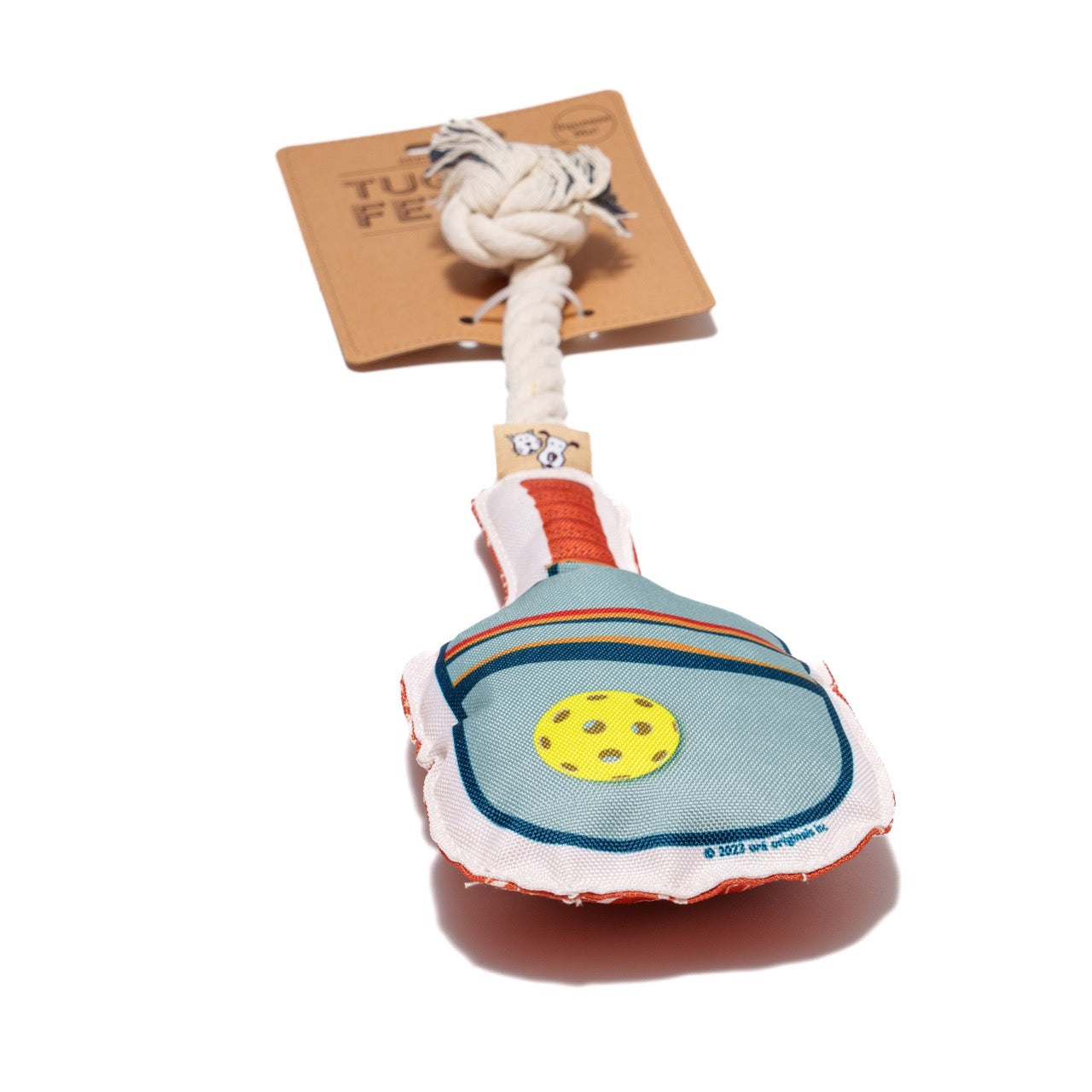 Packaging for dog toy shaped like a pickleball paddle