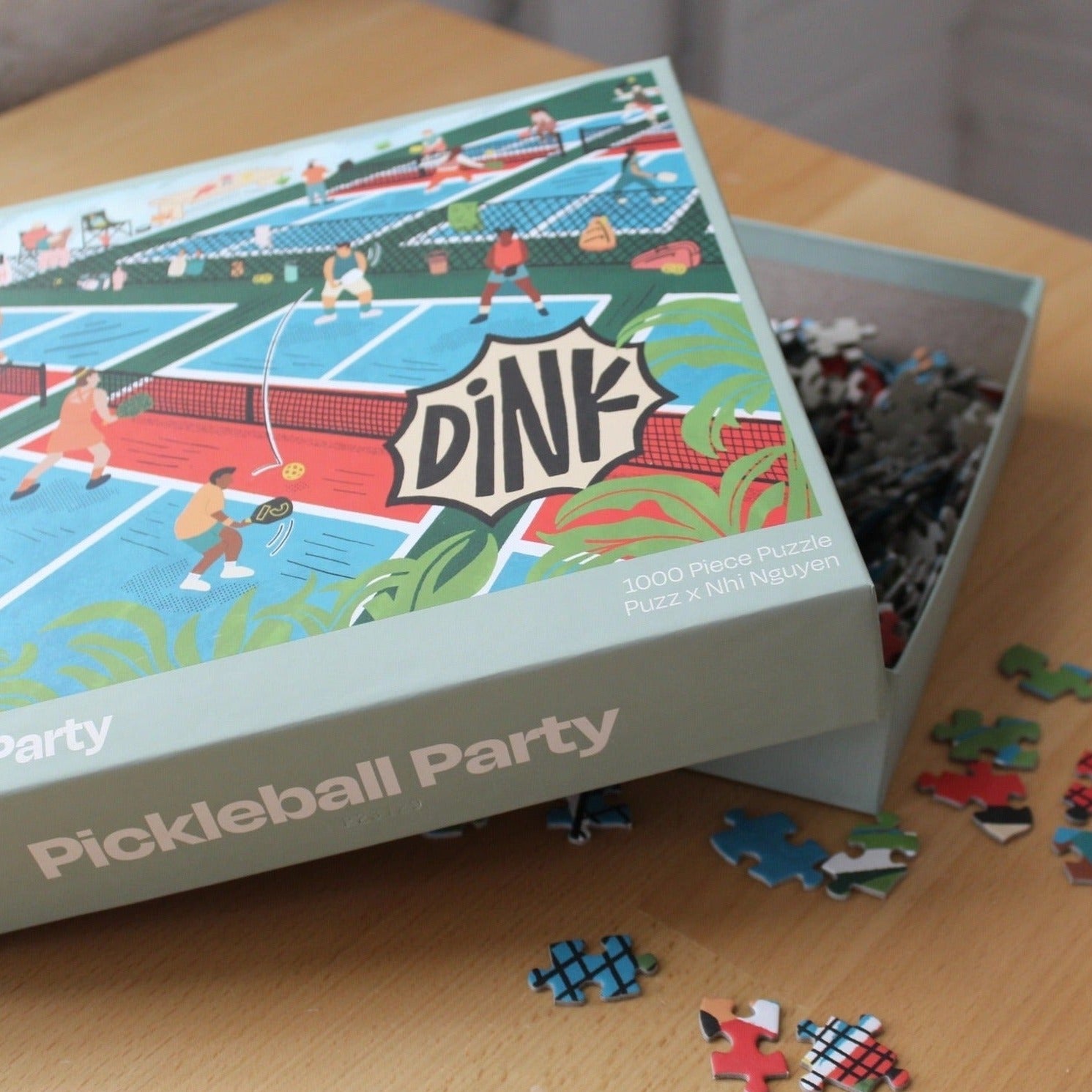 Opened box of a 1,000 Piece Pickleball Jigsaw Puzzle