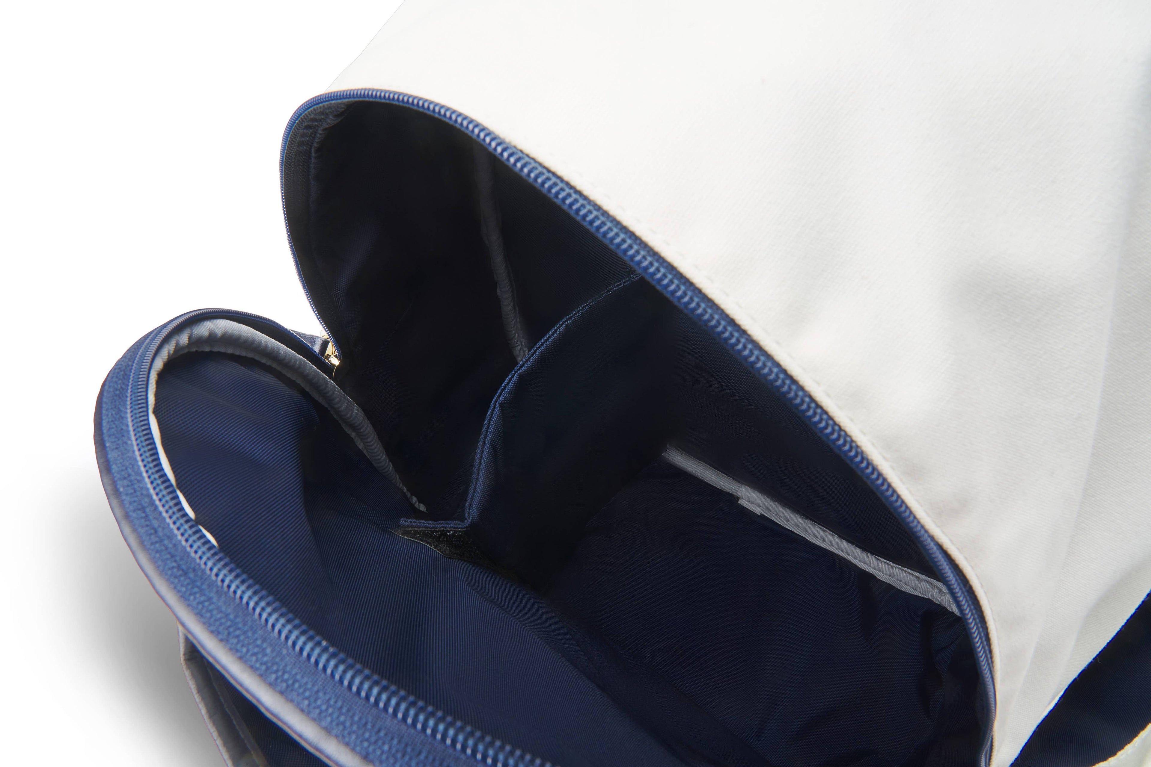 Close up of inside of white pickleball paddle backpack