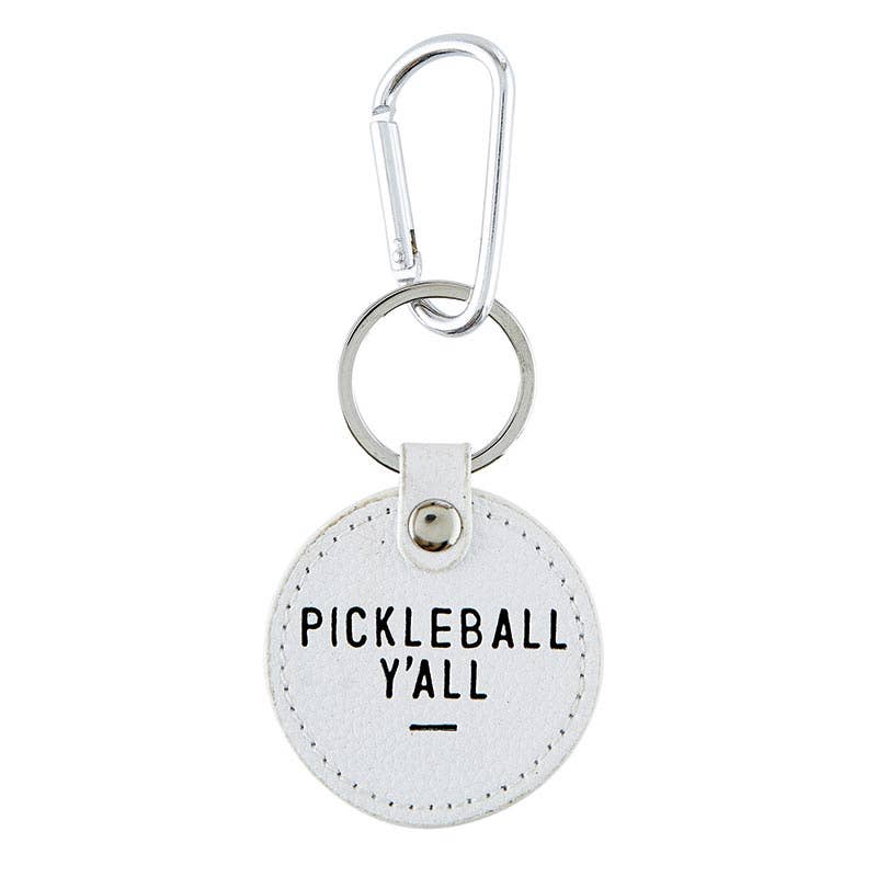 Round white keychain that says "PICKLEBALL Y&