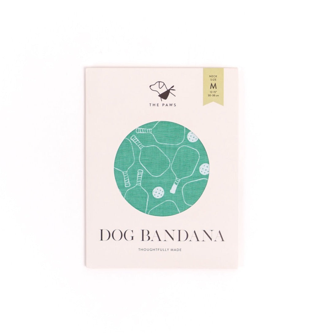 Front of green pickleball Dog Bandana packaging