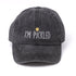Washed black baseball hat that says "I&