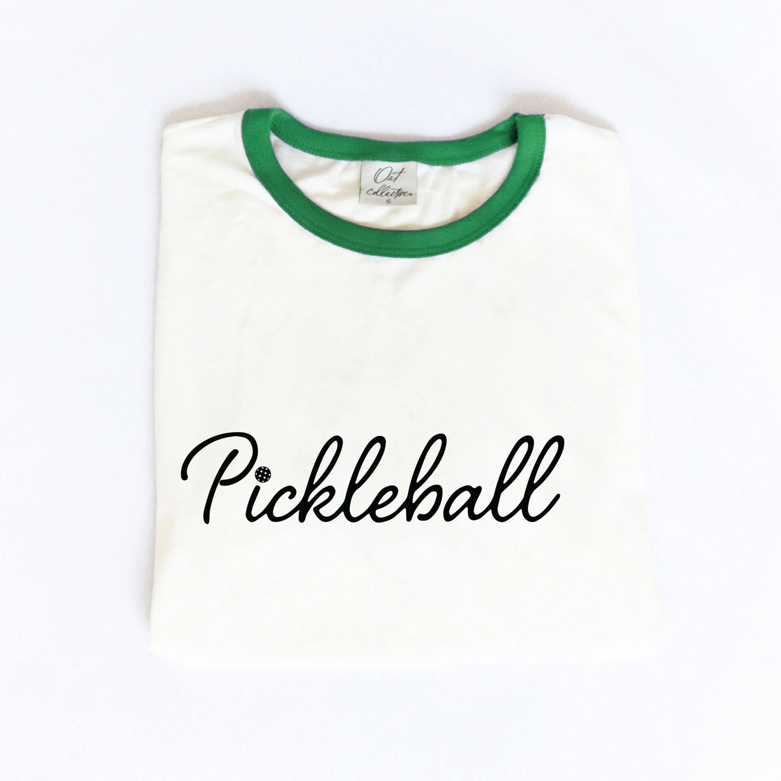White t-shirt with green trim that says Pickleball on it