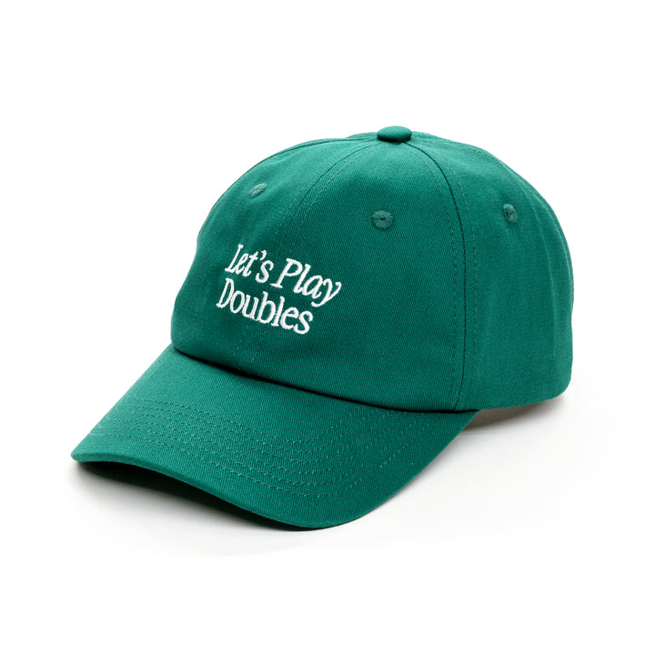 Side view of green baseball hat that says Let's Play Doubles on it